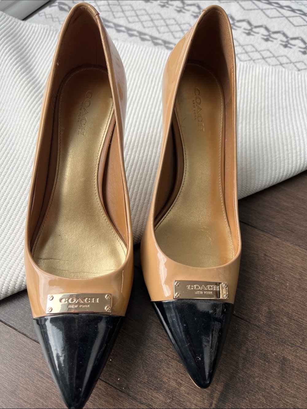 Coach Two-Tone Tan and Black Patent Pointed Toe Pumps
